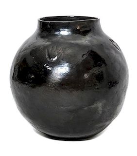 A Santa Clara Blackware Jar Height 18 x diameter 16 1/2 inches.