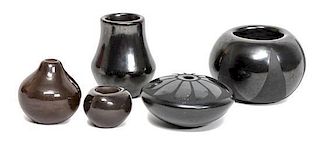 Five Blackware Pueblo Pottery Miniature Vessels Height of tallest 1 1/2 inches.