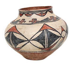 A San Ildefonso Polychrome Jar Height 10 x diameter 11 (approx.) inches.