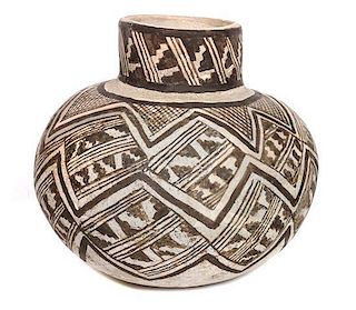 A Prehistoric Black on White Olla with Geometric Design Height 7 x diameter 6 1/2 inches.