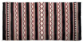 A Navajo Chinle Rug 101 x 62 inches.