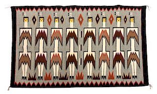 Two Contemporary Navajo Yei Weavings Largest: 52 1/2 x 34 inches.