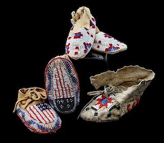 Two Pairs of Northern Plains Child's Moccasins Length of longest 4 1/2 inches.