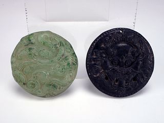 TWO CARVED HARDSTONE DISCS