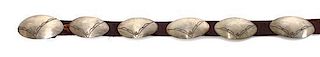 A Hopi Silver Concha Belt, Victor Coochwytewa Buckle height 1 1/4 x width 2 1/2 inches.