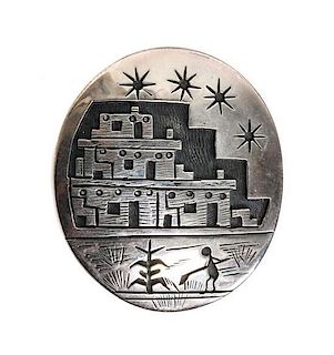 A Hopi Overlay Brooch, Victor Coochwytewa Height 1 3/4 x 1 1/2 inches.