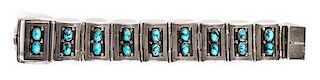 A Hopi Silver and Turquoise Link Bracelet, Lewis Lomay Length 8 inches.