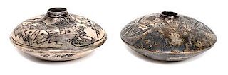 Two Laguna/ Hopi Miniature Silver Seed Jars, Howard J. Sice Diameter of each 1 7/8 inches.