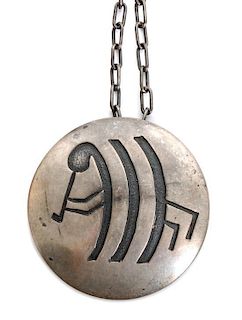A Hopi Silver Pendant Diameter of pendant 2 inches.