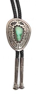 A Hopi Silver and Turquoise Bolo Height 3 x width 2 1/4 inches.