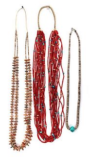 Three Southwestern Shell and Heishi Necklaces Length of first 31 inches.