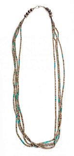 A Four Strand Heishi Necklace Length 30 inches.