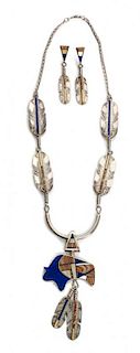A Navajo Multiple Stone Feather and Buffalo Motif Necklace, Robert Vandover Length 20 inches; pendant 3 1/2 inches.