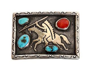 A Cheyenne Silver, Turquoise and Coral Belt Buckle, Ben Nighthorse Campbell (b. 1933) Height 2 1/8 x width 2 5/ 8 inches.