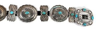 A Navajo Silver and Turquoise Concho Belt Buckle height 3 1/2 x width 4 inches.