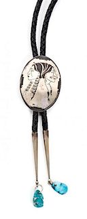 A Lakota Silver and Turquoise Bolo, Paul Szabo Height 2 1/4 x 1 5/8 inches.