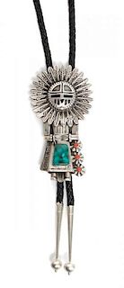 A Navajo Silver, Turquoise and Coral Kachina Bolo Height 4 x width 2 1/8 inches.