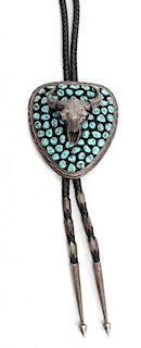 A Navajo Silver and Turquoise Bolo Height 4 x width 3 1/3 inches.