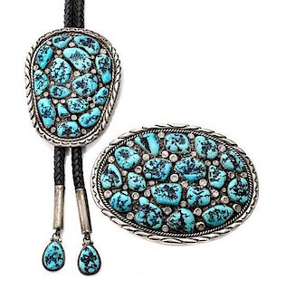 A Large Navajo Silver and Turquoise Bolo and Belt Buckle Set, Henry Morris Buckle 5 x 3 3/4 inches; bolo 4 x 3 inches.
