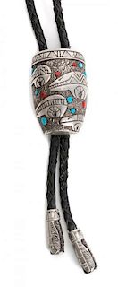 A Navajo Silver, Turquoise and Coral Bolo, Lee Epperson Height 2 x 1/4 inches.