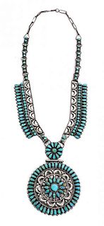 A Navajo Pendant Neclace, Victor Moses Begay Length 22 inches; diameter of medallion 3 inches.