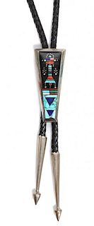 A Navajo Silver and Multiple Stone Inlay Bolo, Jim Harrison Height 2 7/8 x width 1 1/8 inches.