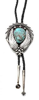 A Navajo Silver and Turquoise Bolo, Attributed to Tom Long Length 3 x width 2 1/2 inches.
