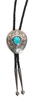 A Navajo Silver and Turquoise Bolo, Thomas Nez Height 2 1/4 x 7/8 inches.