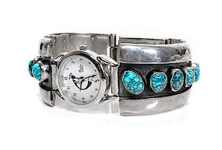 A Navajo Silver and Turquoise Watch Bracelet, Johnny Pablo Length approximately 8 x width 1 1/8 inches.