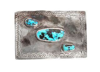 A Silver and Turquoise Three Stone Belt Buckle Height 2 x width 3 inches.