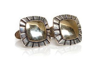 A Pair of Silver and Gold Tone Cuff Links, James Reid Height 3/4 x width 3/4 inches.