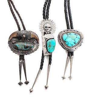 Three Southwestern Silver and Turquoise Bolos Height of first 3 1/4 x width 1 1/2 inches.
