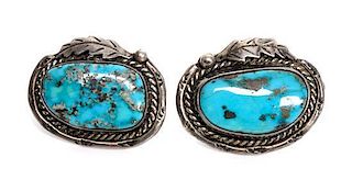 A Pair of Southwestern Silver and Turquoise Cufflinks Length 1/4 inches.