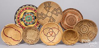 Eight Native American Indian coiled baskets
