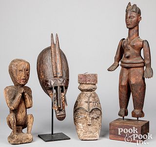 Four African carved items