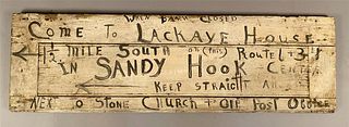 Vintage Sandy Hook Sign on Antique Door