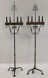 An Antique Pair of Wrought Iron Torchieres.