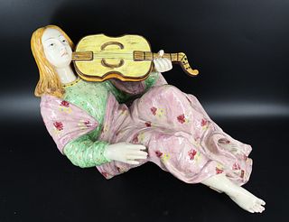 Large Italian Glazed Pottery Figure of a Musician.