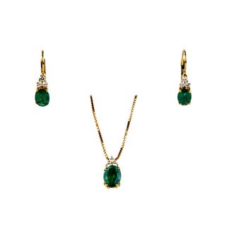 Giorgio Visconti. Gold pendant and earrings with emeralds and diamonds.