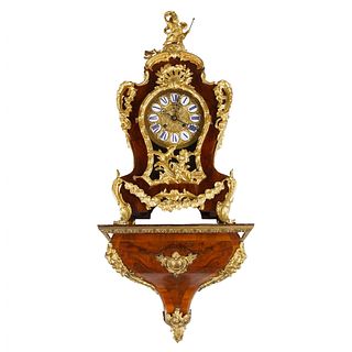 Wall clock with console  Rococo style. 19th century.