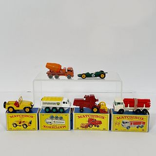 Four Boxed Matchbox 1-75 Regular Wheels Series Vehicles, All die cast metal, including: 58 DAF Girder Truck, tan, blue tinted windows, red plastic pip