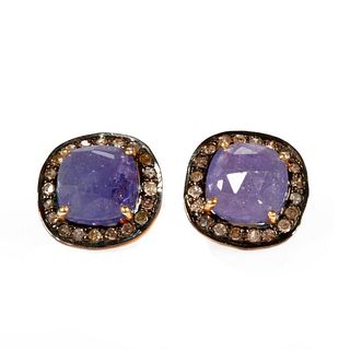 Pair of tanzanite, diamond and silver earrings.