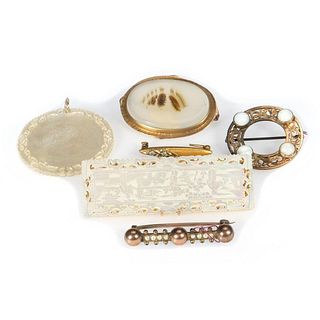 Six antique gold brooches & pendants.