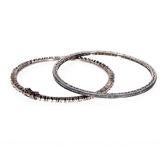 Two sapphire, diamond and silver bangles.