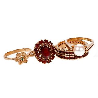 Group of 14k gold and gem-set rings.