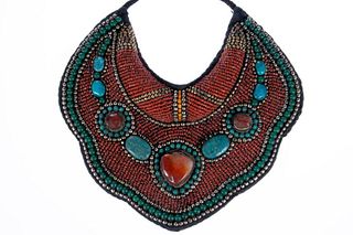 Tribal coral, turquoise and glass bib necklace.