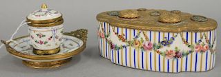 Two French porcelain ink wells including an oblong porcelain inkwell with brass fitted top late 18th to early 19th century and a por...