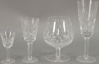 Eighteen Waterford crystal pieces including set of six stemmed cordials, set of four stemmed brandy glasses, set of four large water...