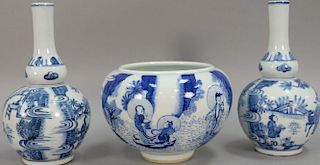 Three blue and white Oriental porcelain pieces to include a pair of double gourd globular vases and a blue and white pot. hts. 6 1/2...