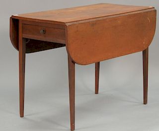 Federal cherry drop leaf table with four drawers, circa 1800. ht. 27", top: 18" x 36"